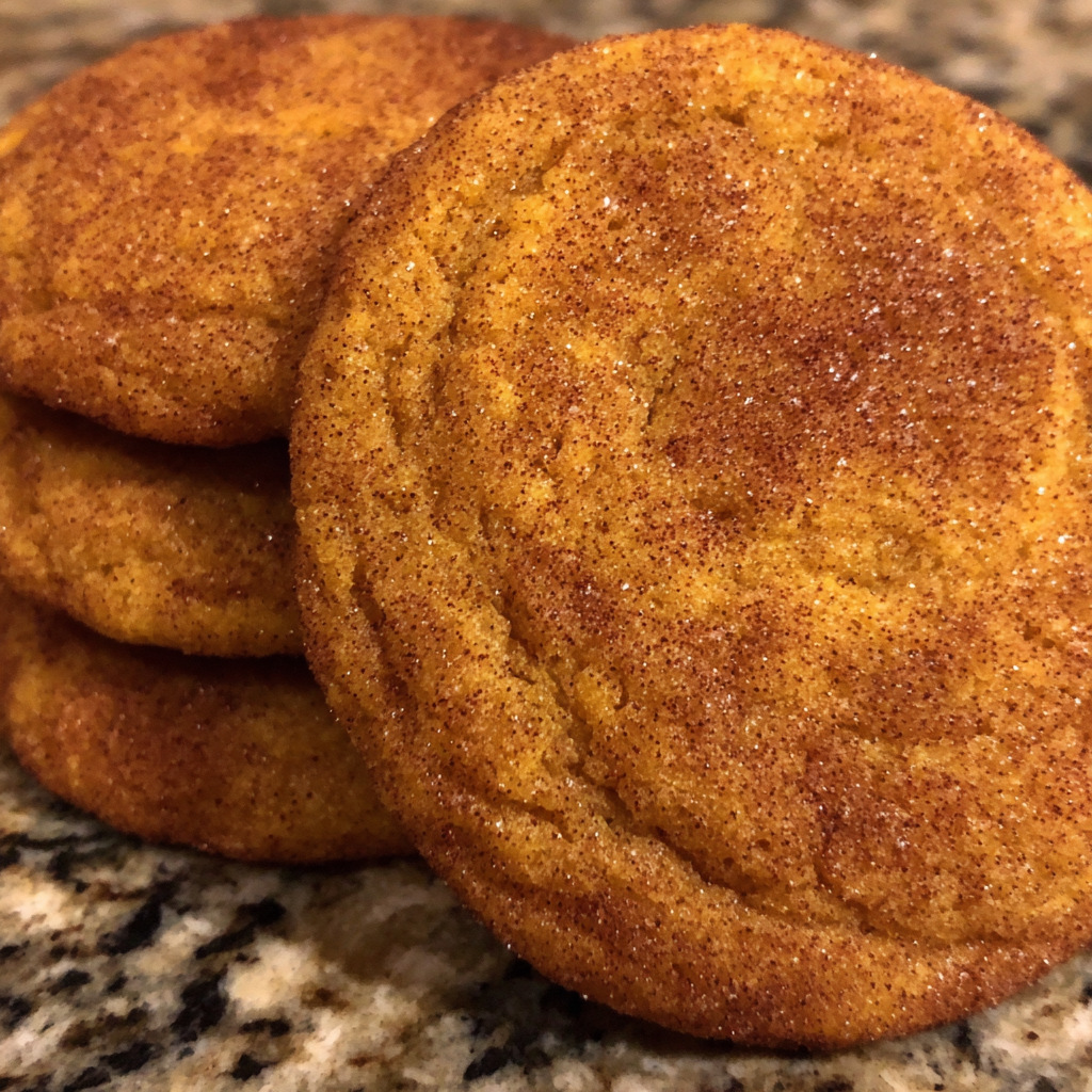 Close-up of pumpkin snickerdoodle cookie with cinnamon sugar coating